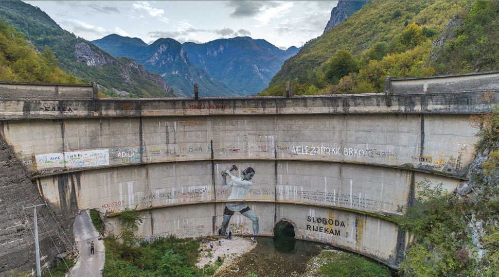 A 15 foot mural on the Idbar dam outside Sarajevo, Bosnia, symbolizing local opposition to dam construction in the