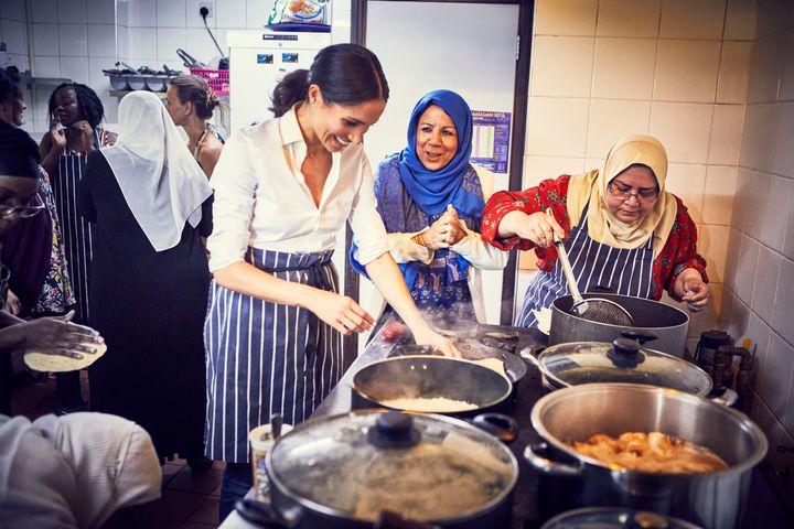The Duchess of Sussex cooking with women in the Hubb Community Kitchen at the Al Manaar Muslim Cultural Heritage Centre in West London.