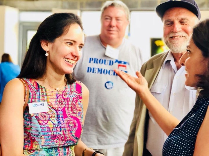 Yasmine Taeb, left, speaks to Center for American Progress Action Fund CEO Neera Tanden, right, at a fundraiser in Fairfax Co