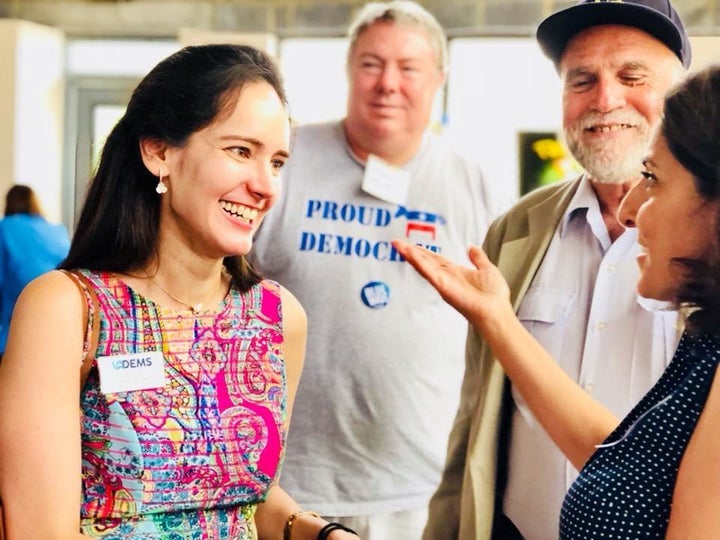 Yasmine Taeb, left, speaks to Center for American Progress Action Fund CEO Neera Tanden, right, at a fundraiser in Fairfax County, Virginia. 