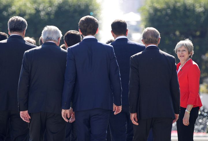 Britain's Prime Minister Theresa May arrives for a family photo during the European Union leaders informal summit in Salzburg.