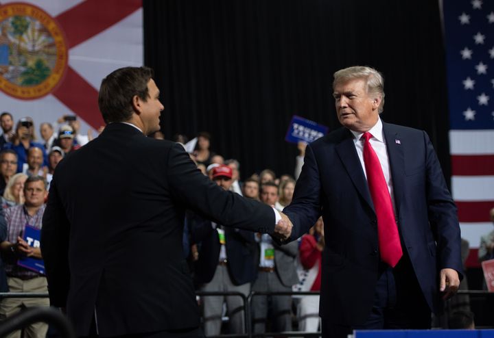 Rep. Ron DeSantis, the Republican nominee in Florida's gubernatorial race, with President Donald Trump at a rally in Tampa on July 31. With Trump’s endorsement, DeSantis rode to an easy win in his primary.