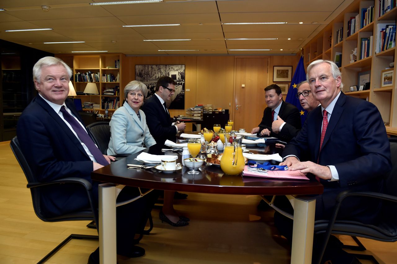 David Davis, Theresa May, European Commission President Jean-Claude Juncker and European Union's chief Brexit negotiator Michel Barnier meet at the European Commission in Brussels last year