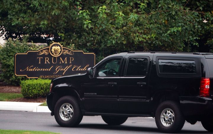 The motorcade carrying President Donald Trump enters the Trump National Golf Club in Sterling, Virginia, on Sept. 8.