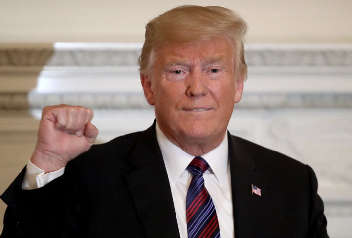 President Donald Trump gestures while delivering remarks to White House dinner guests celebrating evangelical leadership on Aug. 27.