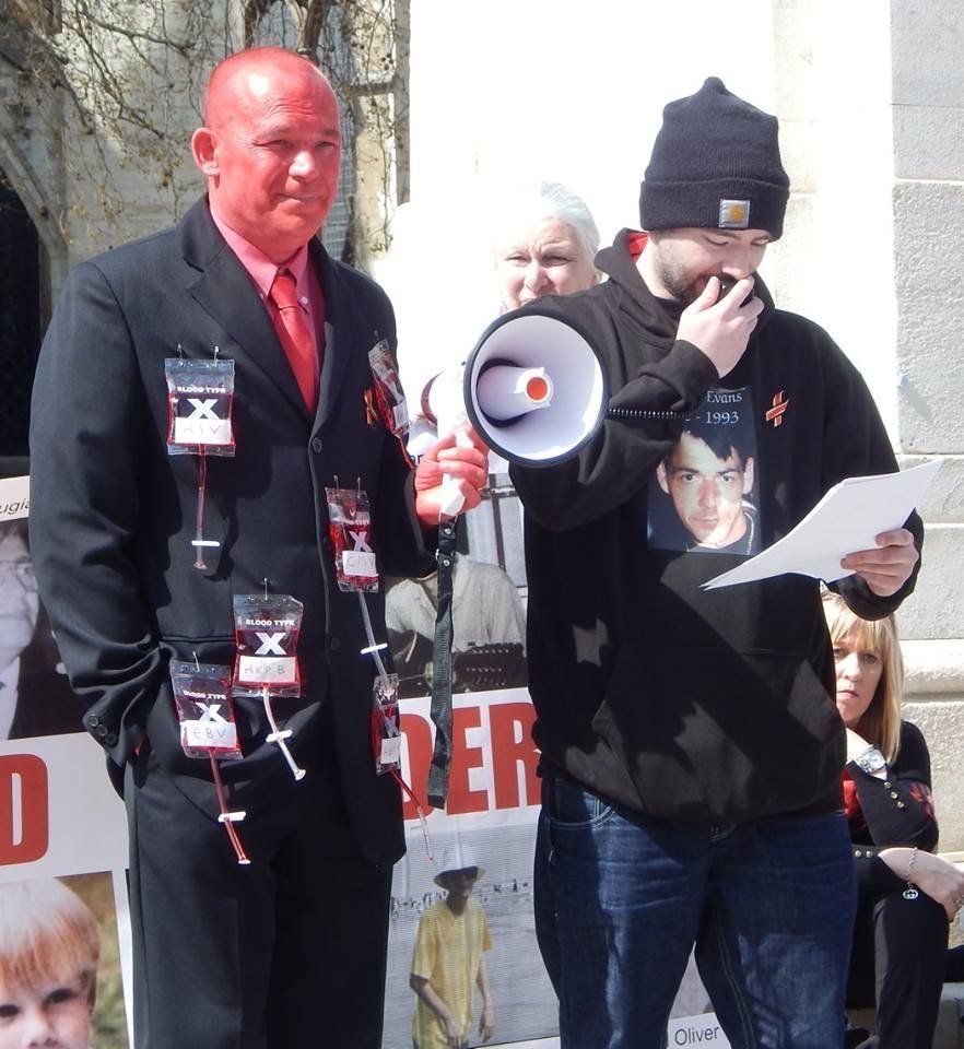 Tony Farrugia left and Jason Evans at a protest over the blood scandal outside Parliament