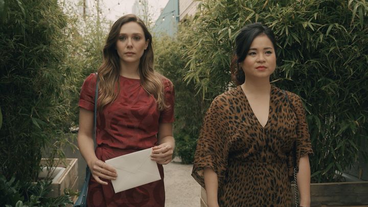 Leigh (Elizabeth Olsen) walks with her sister Jules (Kelly Marie Tran) in "Sorry for Your Loss."