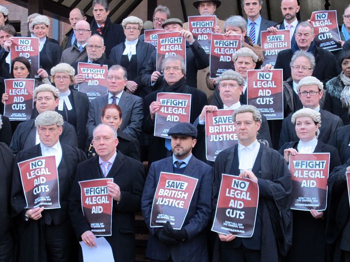 Some of the legal representatives and supporters outside Birmingham Crown Court as barristers around the country stage a walk-out over legal aid cut in 2013