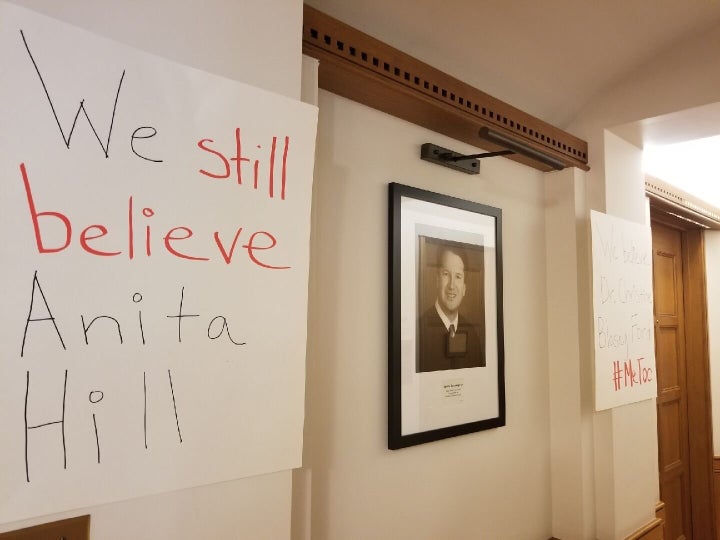 Another sign on Yale's campus, next to a photo of Kavanaugh.