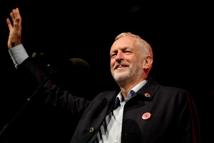 Jeremy Corbyn waves to the gathered party faithful ahead of his address during the Labour Party Rally at Pier Head on September 22, 2018 in Liverpool.
