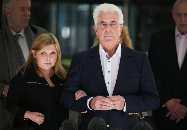 Louise and her father outside Southwark Crown Court in 2014