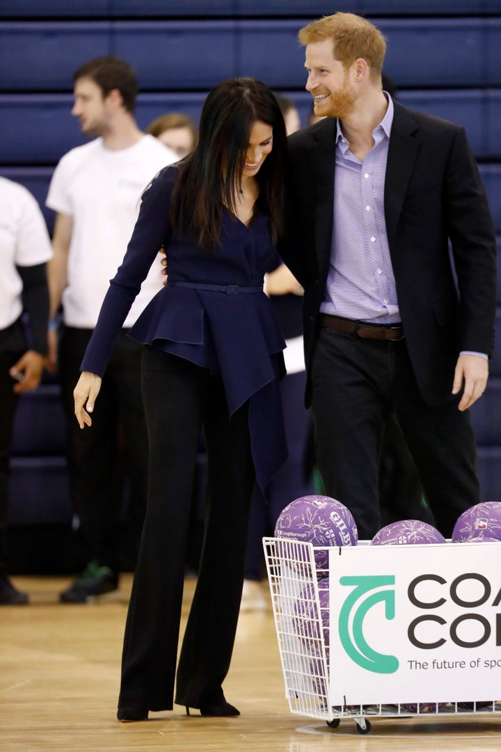 The Duke and Duchess of Sussex sharing a laugh at the Coach Core Awards on Sept. 24. 