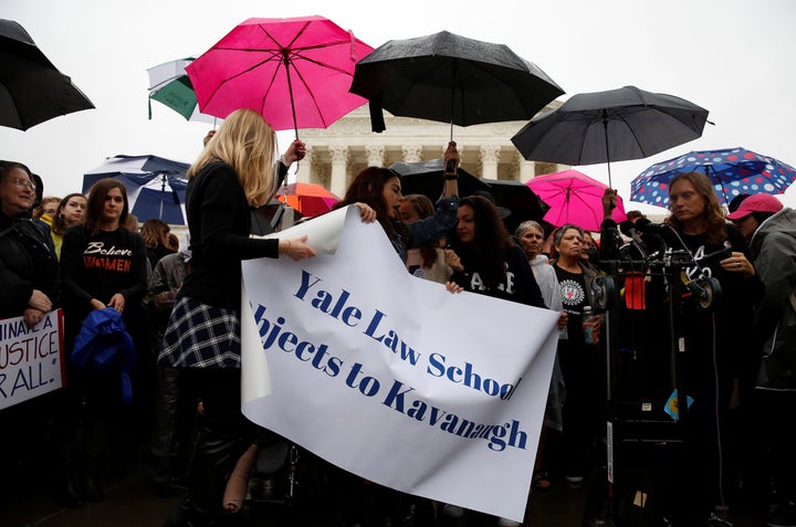 Yale Law students take part in a protest against U.S. Supreme Court nominee Brett Kavanaugh in front of the Supreme Court in Washington on Monday.