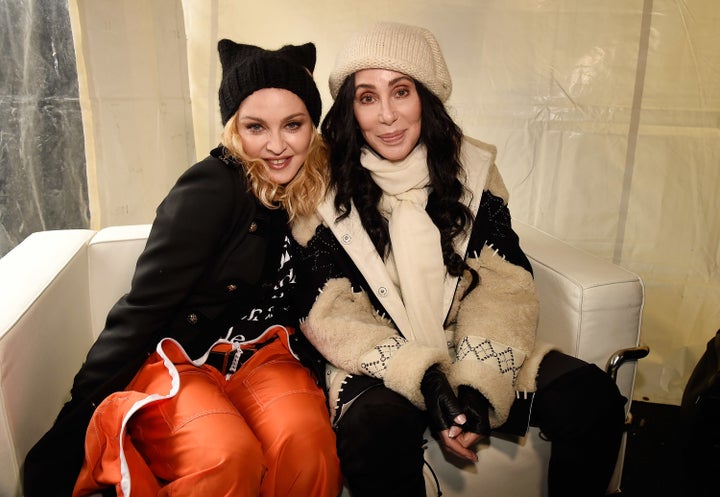 Madonna and Cher sit together during the Women's March on Washington on Jan. 21, 2017.