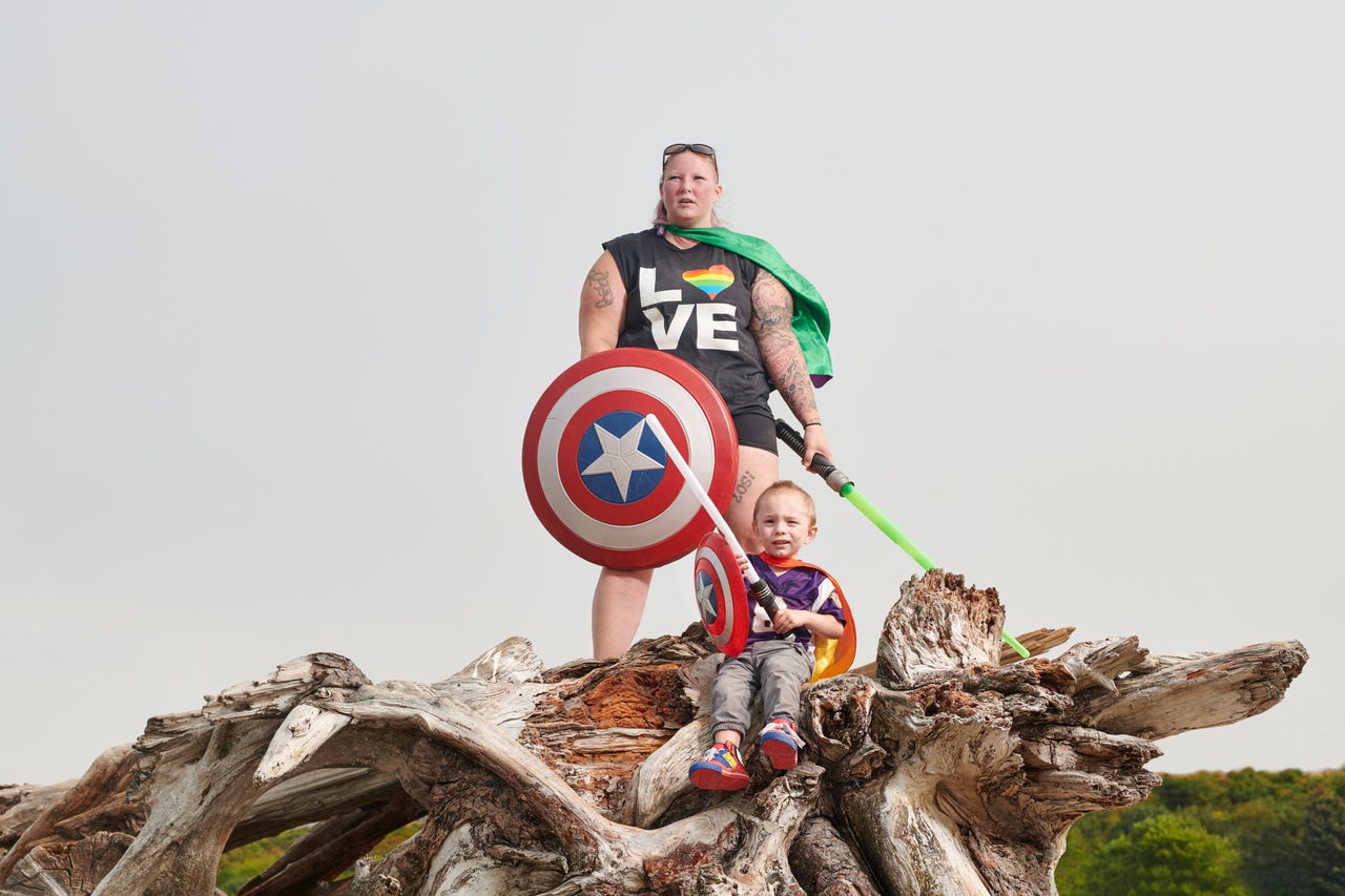 Erin Harrop is a researcher at the University of Washington who studies higher-weight woman with anorexia. She is pictured in the piece wearing a pride shirt alongside her son. “I like that I’m not hiding my stomach, thighs or arms,” she said. “Not because I’m comfortable being photographed like that, but because I want to be — and I want others to feel free to be like that, too.”