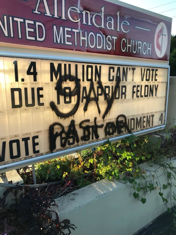 The vandalized church sign was discovered Monday morning.