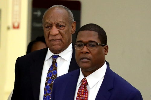 Bill Cosby and publicist Andrew Wyatt at the Montgomery County Courthouse in Norristown, Pennsylvania, on Monday.