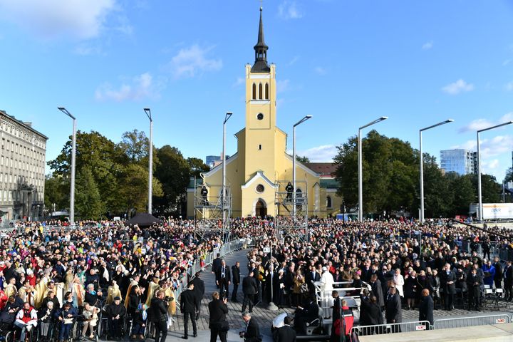 Pope Francis waves to the crowd as he heads to the Liberty Square for a holy mass on Sept. 25 in Tallinn.