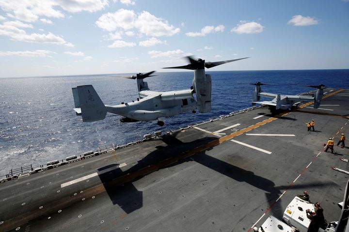A U.S. Marine Corps MV-22 Osprey aircrafts take off from the USS Wasp amphibious assault carrier during an operation in the waters off Japan's southernmost island of Okinawa on March 23, 2018. 