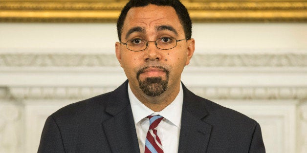 John B. King Jr., who has been appointed by U.S. President Barack Obama to succeed U.S. Secretary of Education Arne Duncan, speaks in the State Dining Room of the White House in Washington October 2, 2015. REUTERS/Joshua Roberts