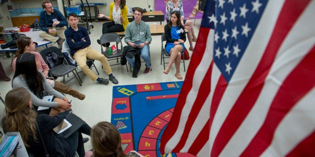 RIVERDALE, MD - APRIL 12: Prospective Teach For America candidates mix with current TFA teachers in an exchange at Templeton Elementary School in Riverdale, MD on April 12, 2016. Teach for America has seen its applicants drop in each of the last three years so they are retooling the way they recruit students. One thing they are doing is taking prospects to see TFA teachers at work. Today, students from Georgetown and George Washington University got a glimpse of life in the classroom. (Photo by Linda Davidson / The Washington Post via Getty Images)