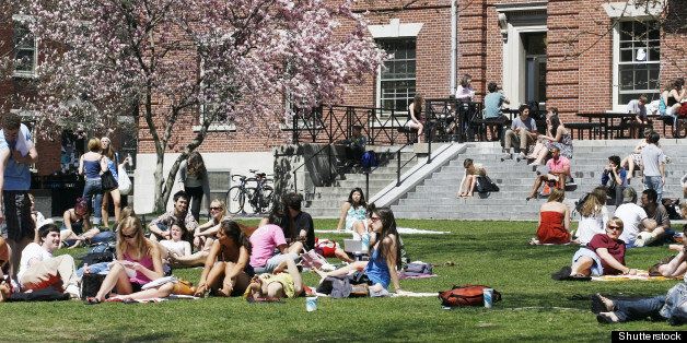college students enjoying spring weather on campus