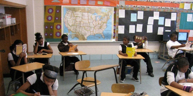 In this March 15, 2011 photo, students study at the African-centered Timbuktu Academy of Science and Technology in Detroit. Timbuktu has about 350 students in kindergarten through eighth grade and is one of nine Detroit Public Schools-authorized charter schools. The school districtâs emergency financial manager is proposing turning the operation of 41 academically challenged schools over to charter operators to help cut into a $327 million legacy budget deficit. (AP Photo)