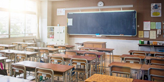 Sun shining on an empty Japanese classroom.