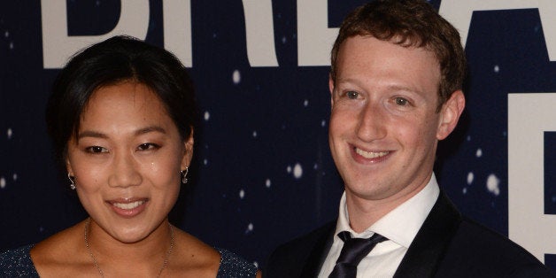 MOUNTAIN VIEW, CA - NOVEMBER 09: Priscilla Chan and Mark Zuckerberg attend the 2014 Breakthrough Prize Awards at NASA AMES Research Center on November 9, 2014 in Mountain View, California. (Photo by C Flanigan/FilmMagic)