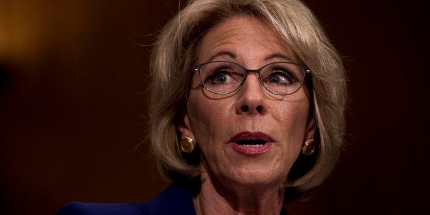 WASHINGTON, DC - President-elect Donald Trump's nominee for Secretary of the Education Betsy DeVos appears before the Senate Health, Education, Labor and Pensions Committee for her confirmation hearing on Capitol Hill in Washington, DC Tuesday January 17, 2017. (Photo by Melina Mara/The Washington Post via Getty Images)