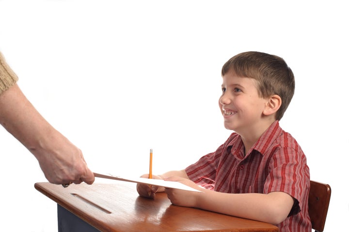 A boy in school about to take a test