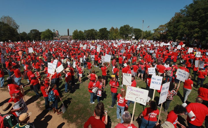 CHICAGO, IL - SEPTEMBER 15: Striking Chicago teachers and their supporters attend a rally at Union Park September 15, 2012 i