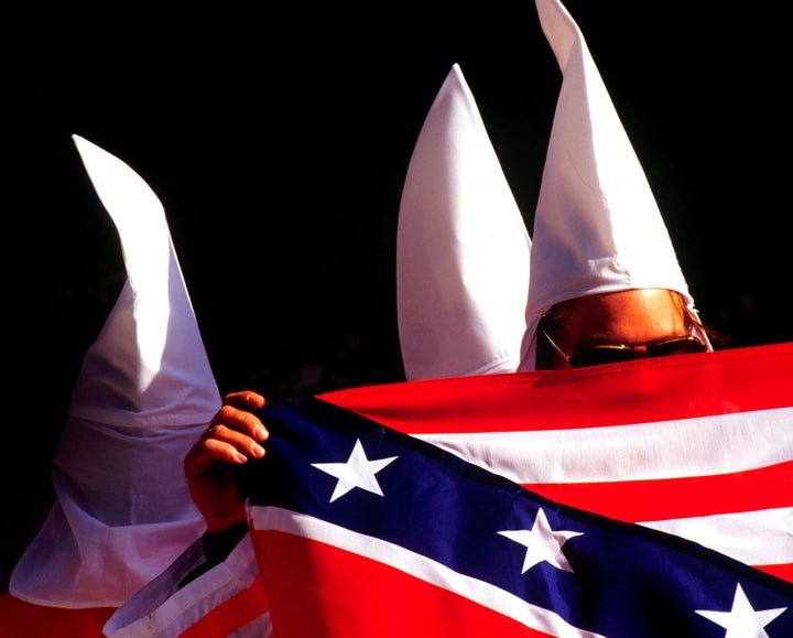 Students dressed in KKK robes for class project at Vegas school