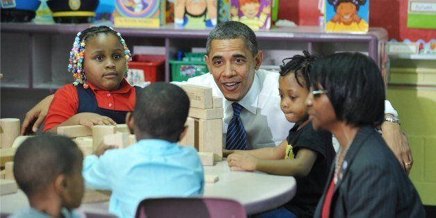 US President Barack Obama chats with students as he tours a classroom in the Yeadon Regional Head Start Center November 8, 2011 in Yeadon, Pennsylvania. AFP PHOTO/Mandel NGAN (Photo credit should read MANDEL NGAN/AFP/Getty Images)
