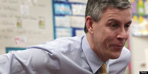 TAKOMA PARK, MD - MARCH 01: Education Secretary Arne Duncan speaks to students after reading the Dr. Seuss book 'Green Eggs and Ham' at Rolling Terrace Elementary School March 1, 2013 in Takoma Park, Maryland. Duncan and HHS Secretary Kathleen Sebelius toured the school in an effort to highlight U.S. President Barack Obama's proposals to expand high-quality learning opportunities as mentioned in his State of the Union speech. (Photo by Win McNamee/Getty Images)