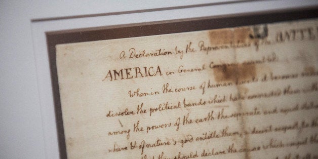 NEW YORK, NY - JULY 01: A copy of The Declaration Of Independence is displayed at the New York Public Library on July 1, 2014 in New York City. The copy, which was written by Thomas Jefferson, will be on display through July 3. (Photo by Andrew Burton/Getty Images)