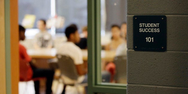 In this Aug. 29, 2013 photo, students listen to a lecture during an open house for incoming freshman and transfer students at