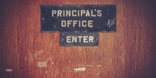 Retro Filtered Image Of A Grungy Principal's Office Door At A Public School In The USA