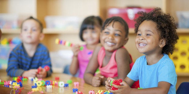 A diverse group of preschoolers in a classroom