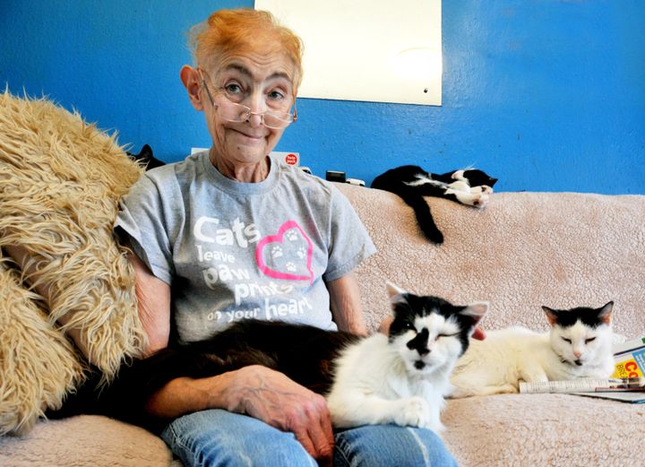 Marlene and some of her cats.