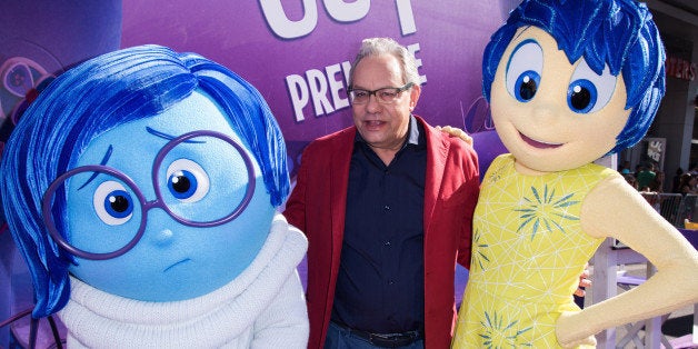 FILE - In this Monday, June 8, 2015 file photo, Lewis Black, center, attends the Los Angeles premiere of "Inside Out" at the El Capitan Theatre in Los Angeles. Blackâs Anger stars alongside Fear (Bill Hader), Disgust (Mindy Kaling), Sadness (Phyllis Smith) and Joy (Amy Poehler) in the animated Disney-Pixar feature out June 19. (Photo by Dan Steinberg/Invision/AP, File)