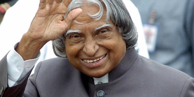 NEW DELHI, INDIA: Indian President A.P.J. Abdul Kalam waves at New Delhi's Air Force station, 11 September 2004, prior to hi