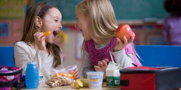 Students eating lunch in classroom