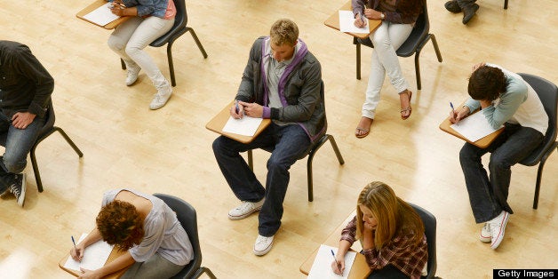 College students taking test in classroom