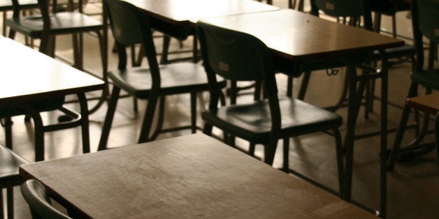 A view of a class room(chairs and tables) at a junior high school