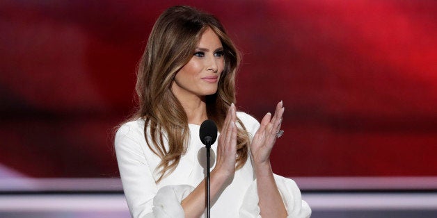 Melania Trump, wife of Republican Presidential Candidate Donald Trump, applauds as she recognizes veterans during the opening