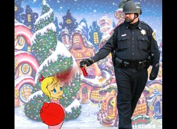 Pepper Spraying Cop