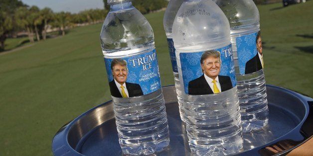 A waitress passes out Trump water bottles at Trump Doral, Feb. 6, 2014, in Doral, Fla. (Patrick Farrell/Miami Herald/MCT via Getty Images)