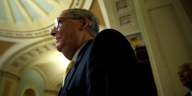 U.S. Senate Majority Leader Mitch McConnell (R-KY) walks to a news conference after the weekly Republican caucus luncheon at the U.S. Capitol in Washington, September 29, 2015. REUTERS/Jonathan Ernst