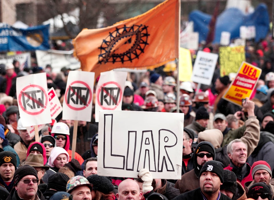 Protesters Hold Signs Outside Of Michigan Capitol